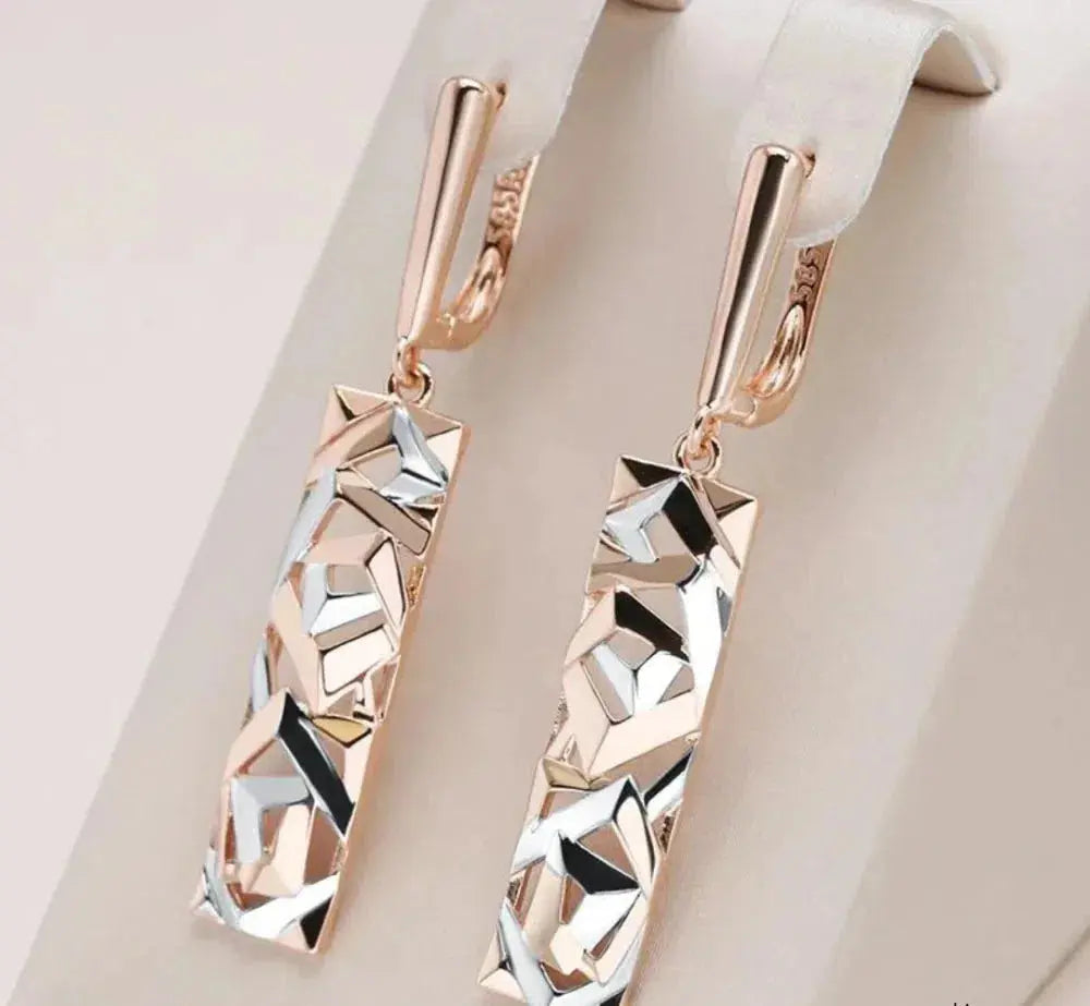 Aretes rectangulares elegantes en oro y plata