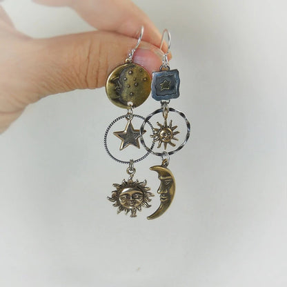 Pendientes con colgante de sol y luna