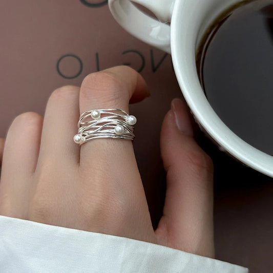Anillo vintage de plata y perlas