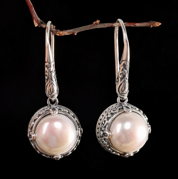 Pendientes vintage de plata con incrustaciones de perlas