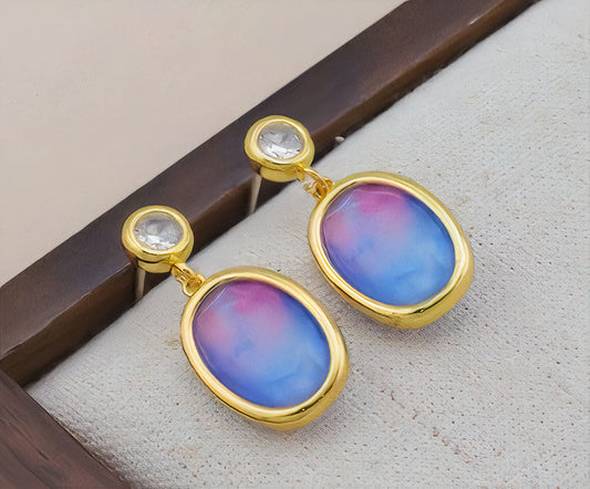 Pendientes de perlas con piedra incrustada azul