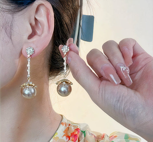Pendientes colgantes de perlas atemporales