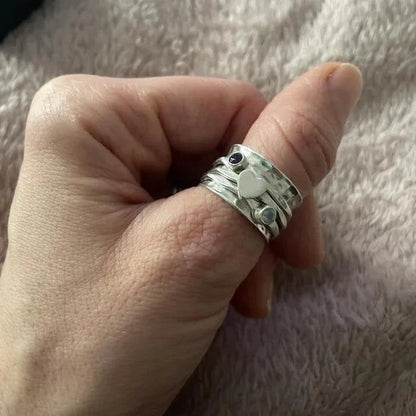 Anillo de corazón giratorio