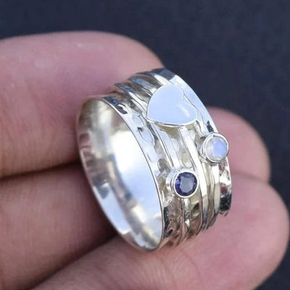 Anillo de corazón giratorio