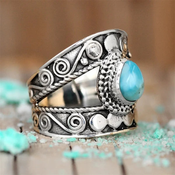Anillo de aro calado con gota turquesa