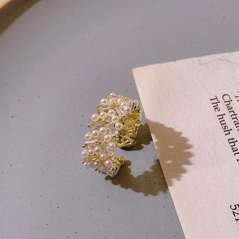 Anillo de perlas de lujo en oro