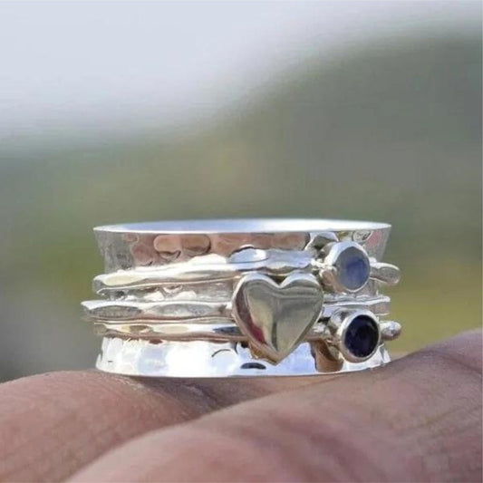 Anillo de corazón giratorio
