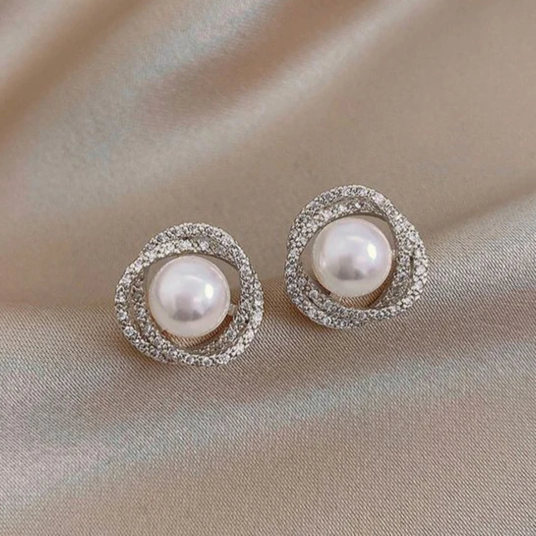 Pendientes de perlas en espiral elegantes y brillantes