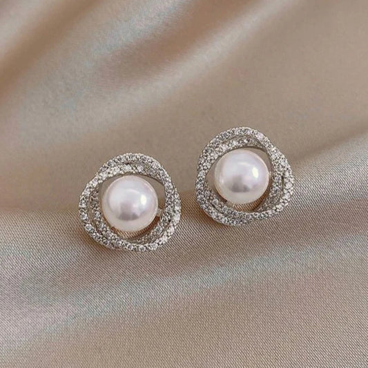 Pendientes de perlas en espiral elegantes y brillantes