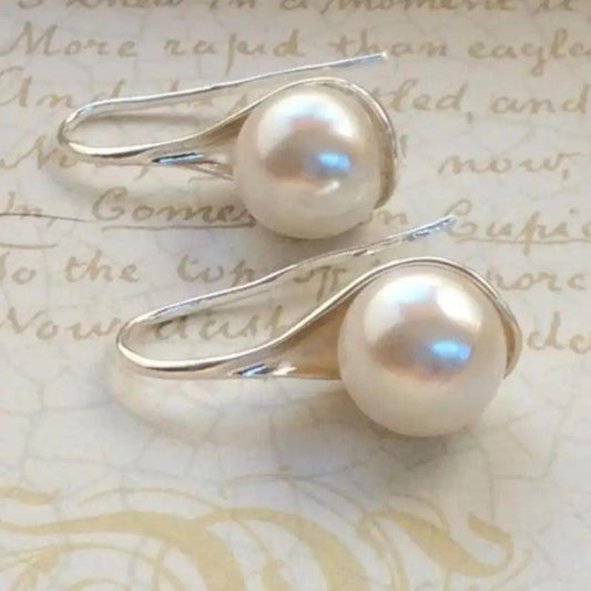 Pendientes elegantes con perlas
