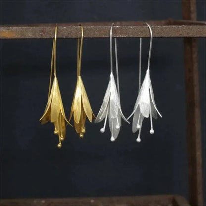 Pendientes vintage de loto en oro y plata