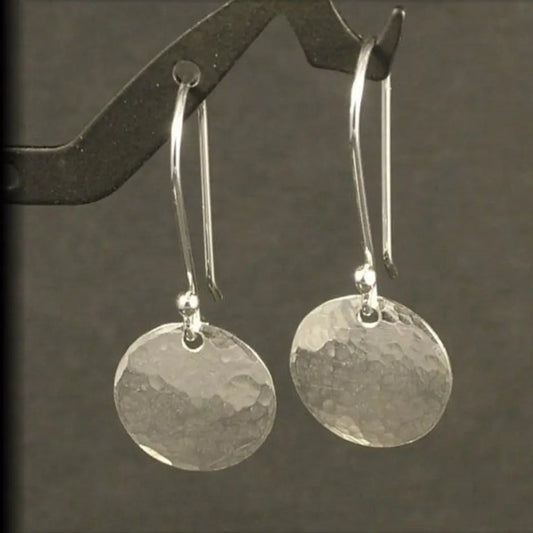Pendientes redondeados plateados vintage