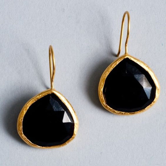Pendientes de piedra negra vintage con oro