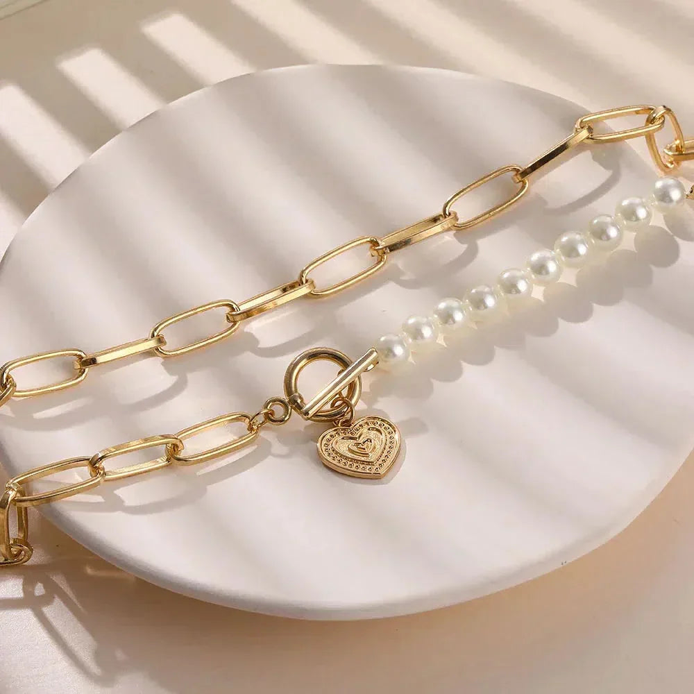 Dije con Cruz de Corazón con Perlas en Oro