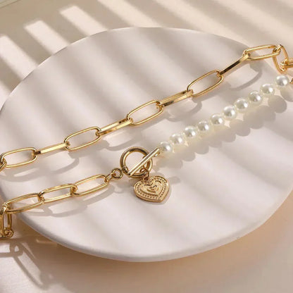 Dije con Cruz de Corazón con Perlas en Oro