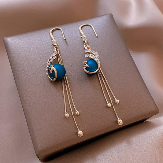 Pendientes festivos con cuentas azules