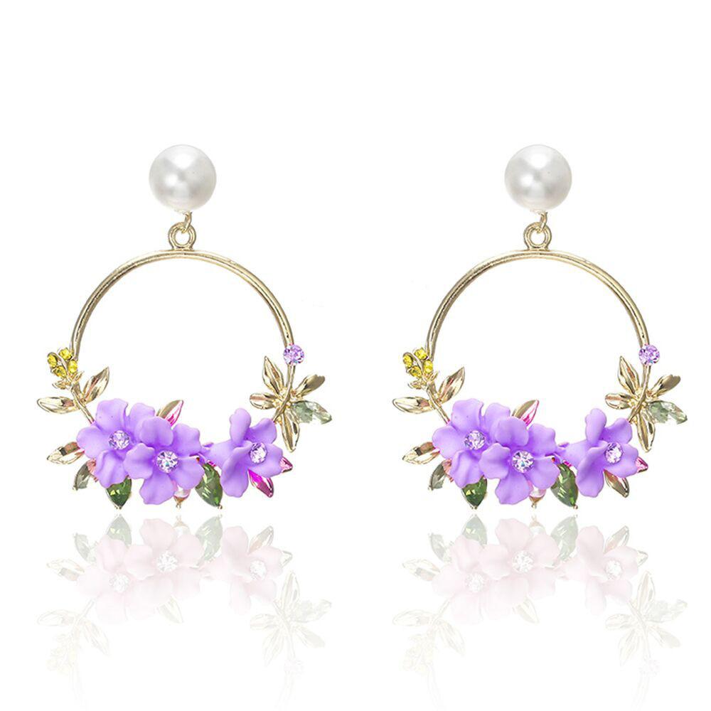 Pendientes de flor y perla de oro