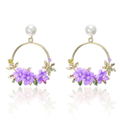 Pendientes de flor y perla de oro