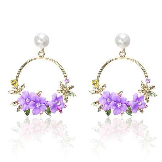 Pendientes de flor y perla de oro