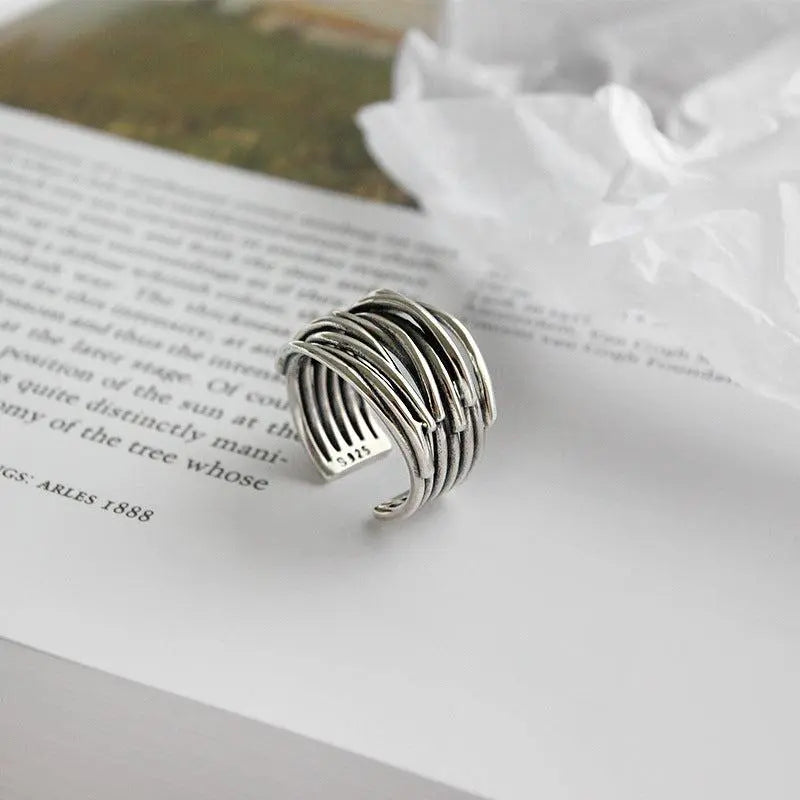 Anillo ajustable de capa de plata