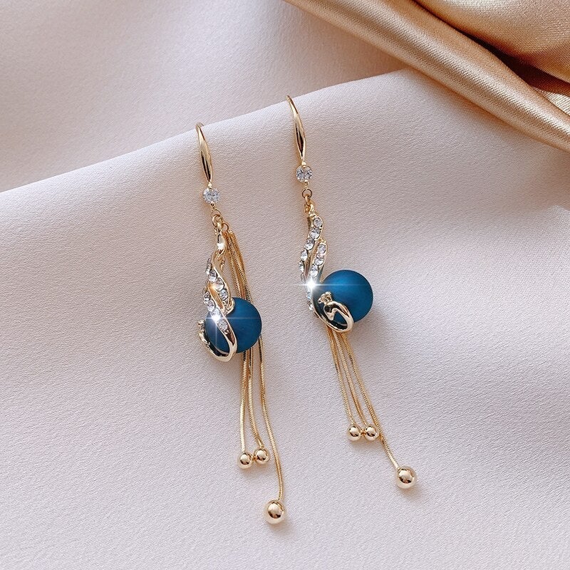 Pendientes festivos con cuentas azules