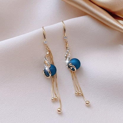 Pendientes festivos con cuentas azules