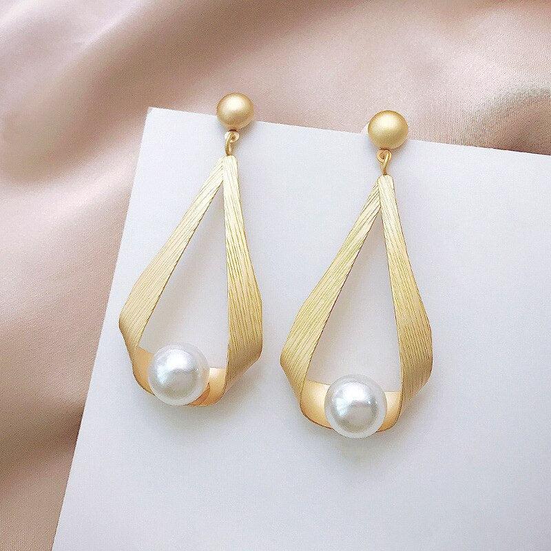 Pendientes de cristal y perlas redondas