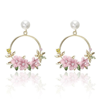 Pendientes de flor y perla de oro