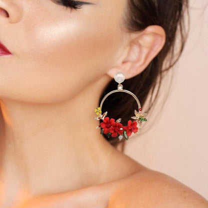 Pendientes de flor y perla de oro
