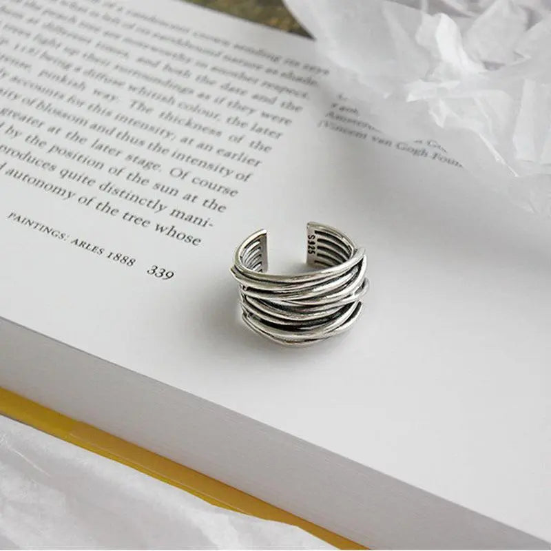 Anillo ajustable de capa de plata