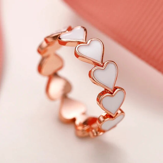 Anillo vintage blanco con corazón y acabado en oro rosa