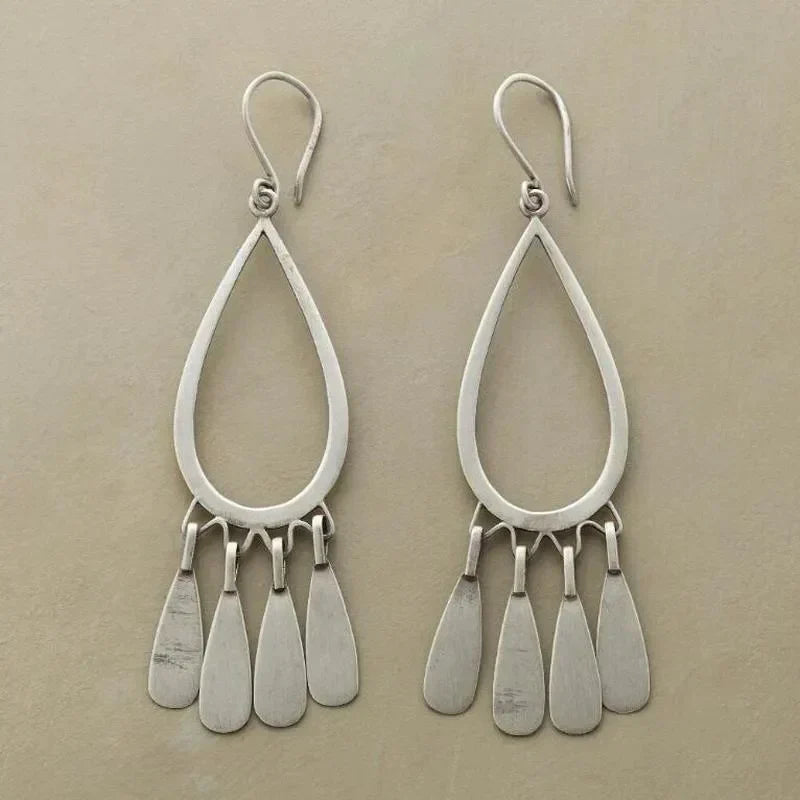 Pendientes vintage de plata con diseño de lluvia