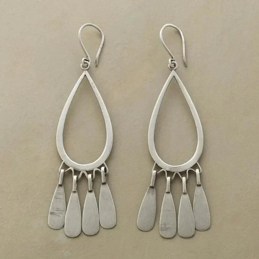 Pendientes vintage de plata con diseño de lluvia