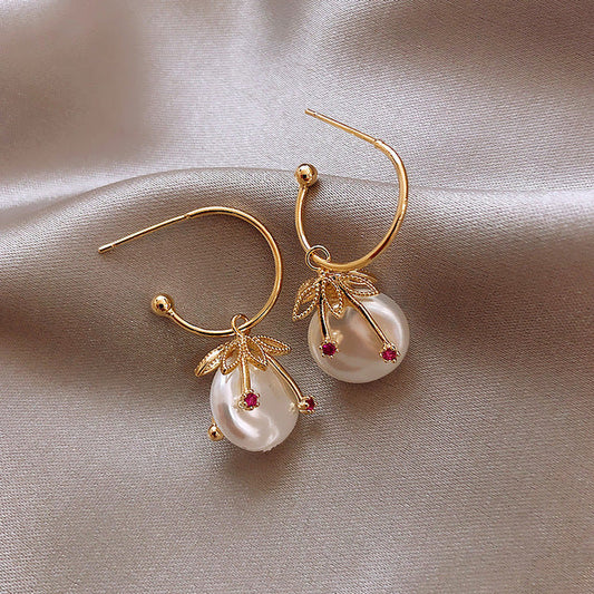 Aretes de perla libélula en oro