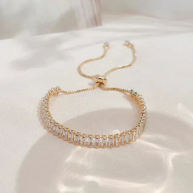 Pulsera ajustable de circonio cúbico en oro y plata