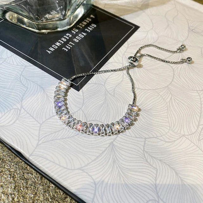 Pulsera ajustable de circonio cúbico en oro y plata