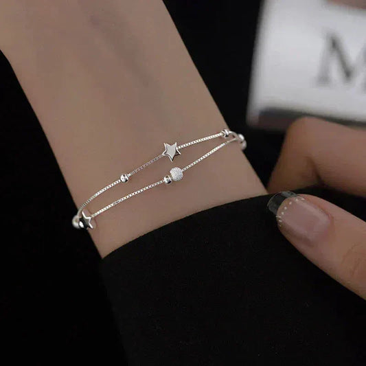Pulsera de plata con estrellas