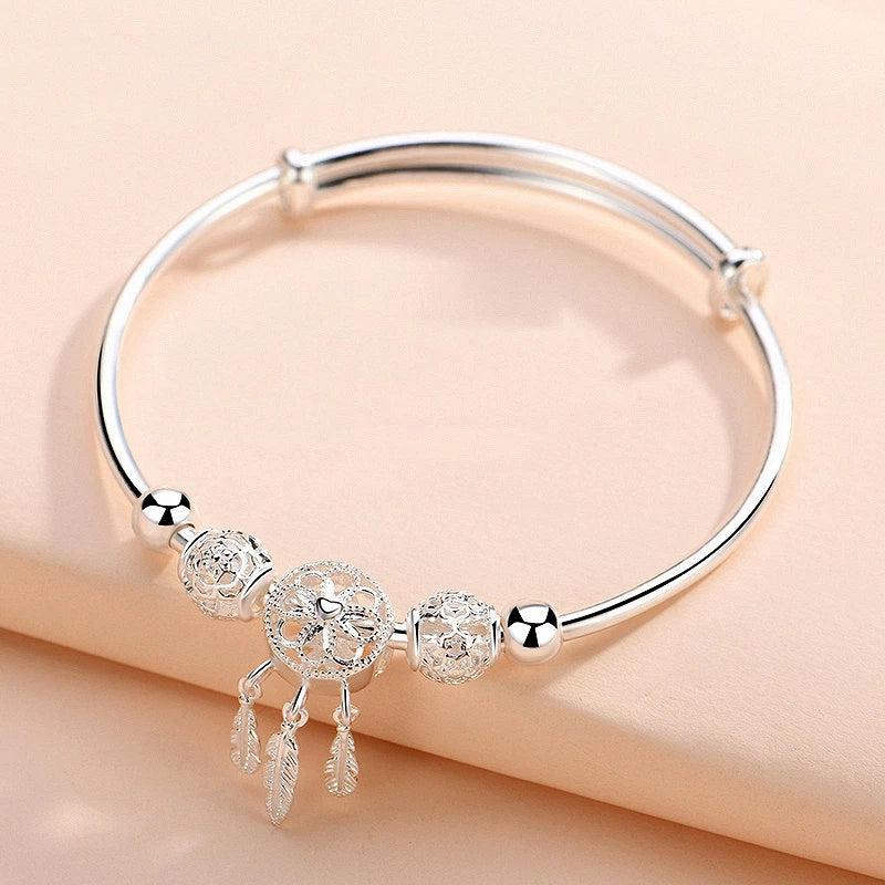 Pulsera ajustable de dijes con atrapasueños de plata 925
