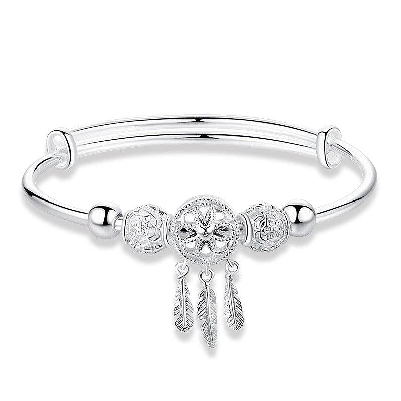 Pulsera ajustable de dijes con atrapasueños de plata 925