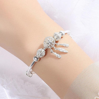 Pulsera ajustable de dijes con atrapasueños de plata 925