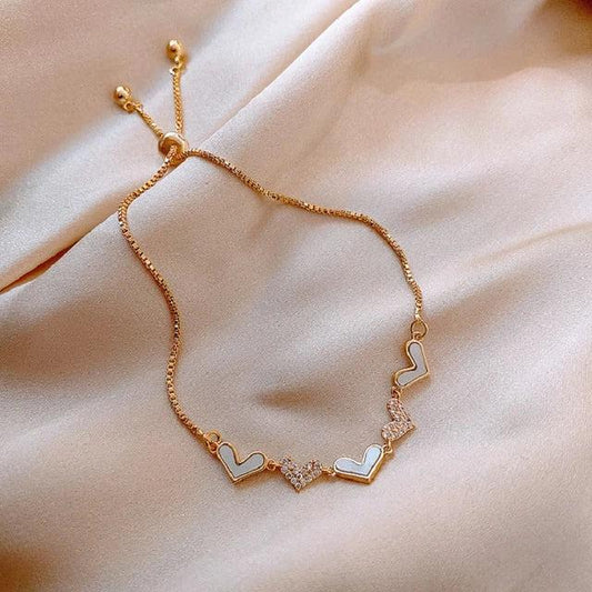 Pulsera ajustable de corazón dorado