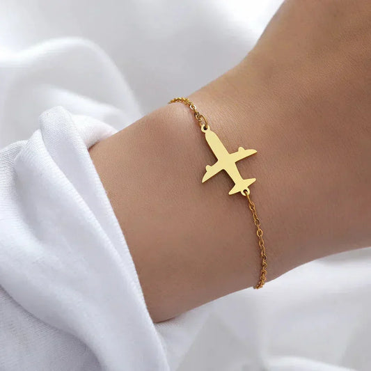 Pulsera de avión dorado