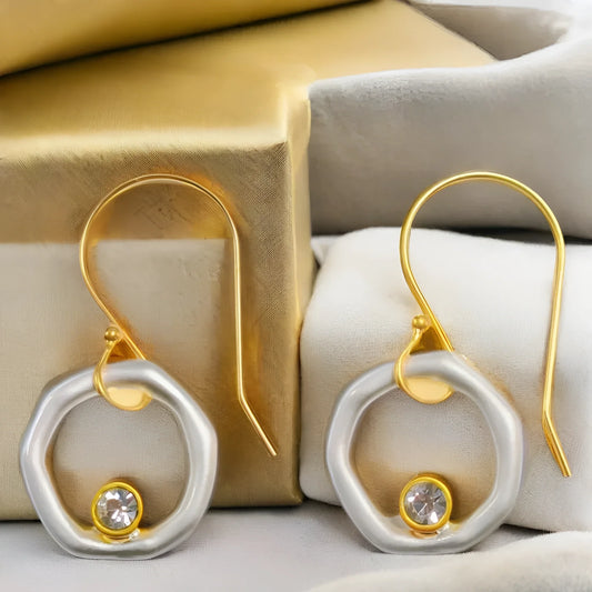 Pendientes de aro bicolor con piedra transparente
