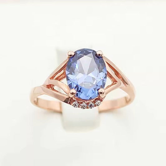 Anillo vintage de cristal azul con oro rosa