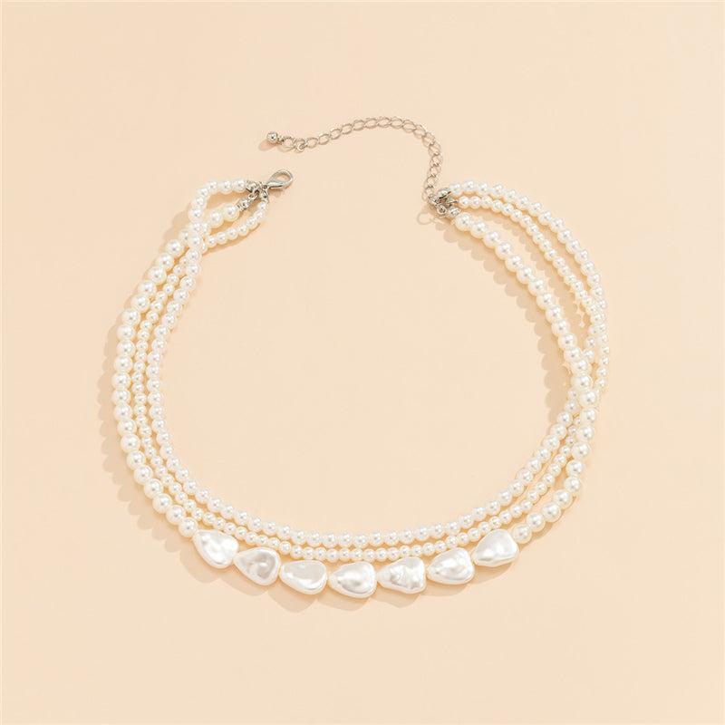 Collar de piedra blanca y perlas en dorado
