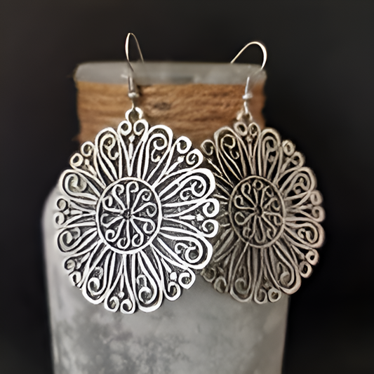 Aretes redondeados con mandala hueco vintage