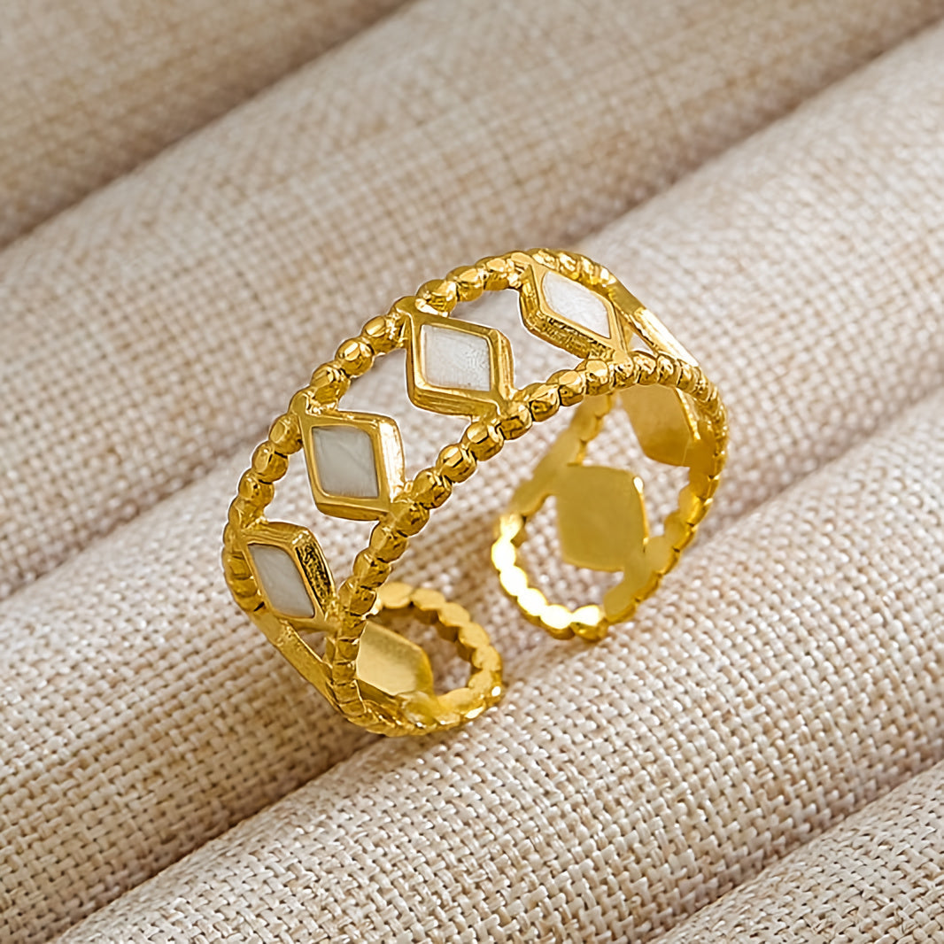 Anillo vintage de oro hueco con cristal