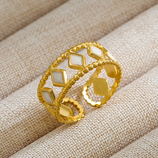 Anillo vintage de oro hueco con cristal