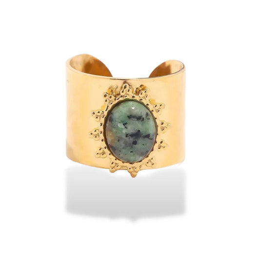 Anillo vintage con incrustaciones de piedra dorada