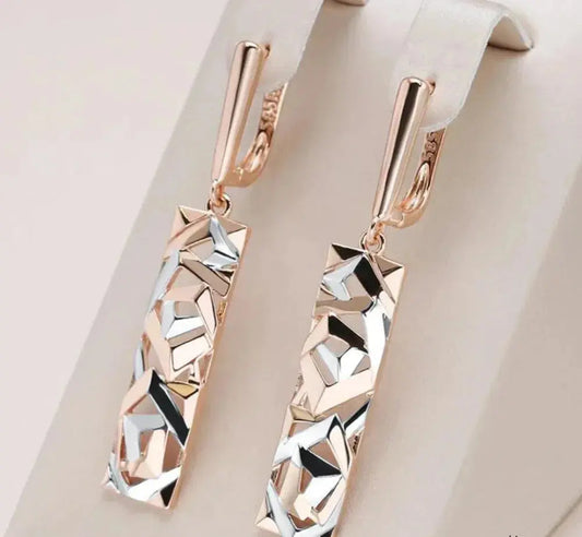 Aretes rectangulares elegantes en oro y plata